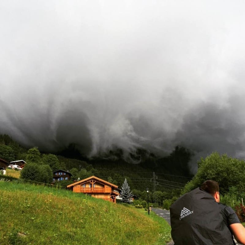 storm clouds shroud the mountains over les houches