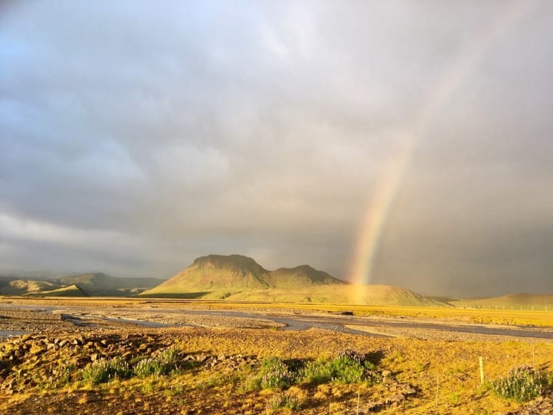 Iceland south road at sunset with rainbow 